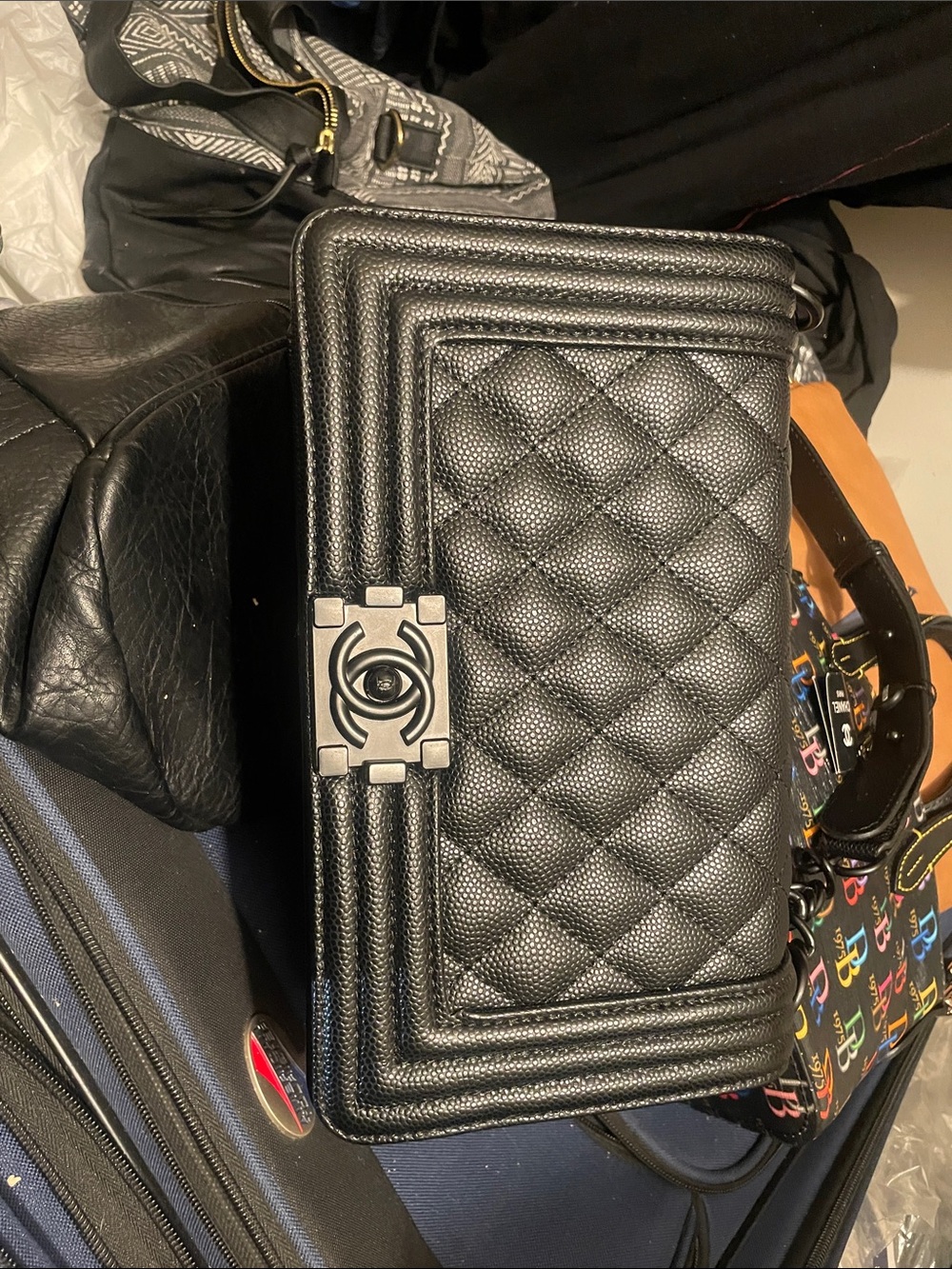 CHANEL Black Quilted Boy Wallet-on-Chain with Signature CC Lock
